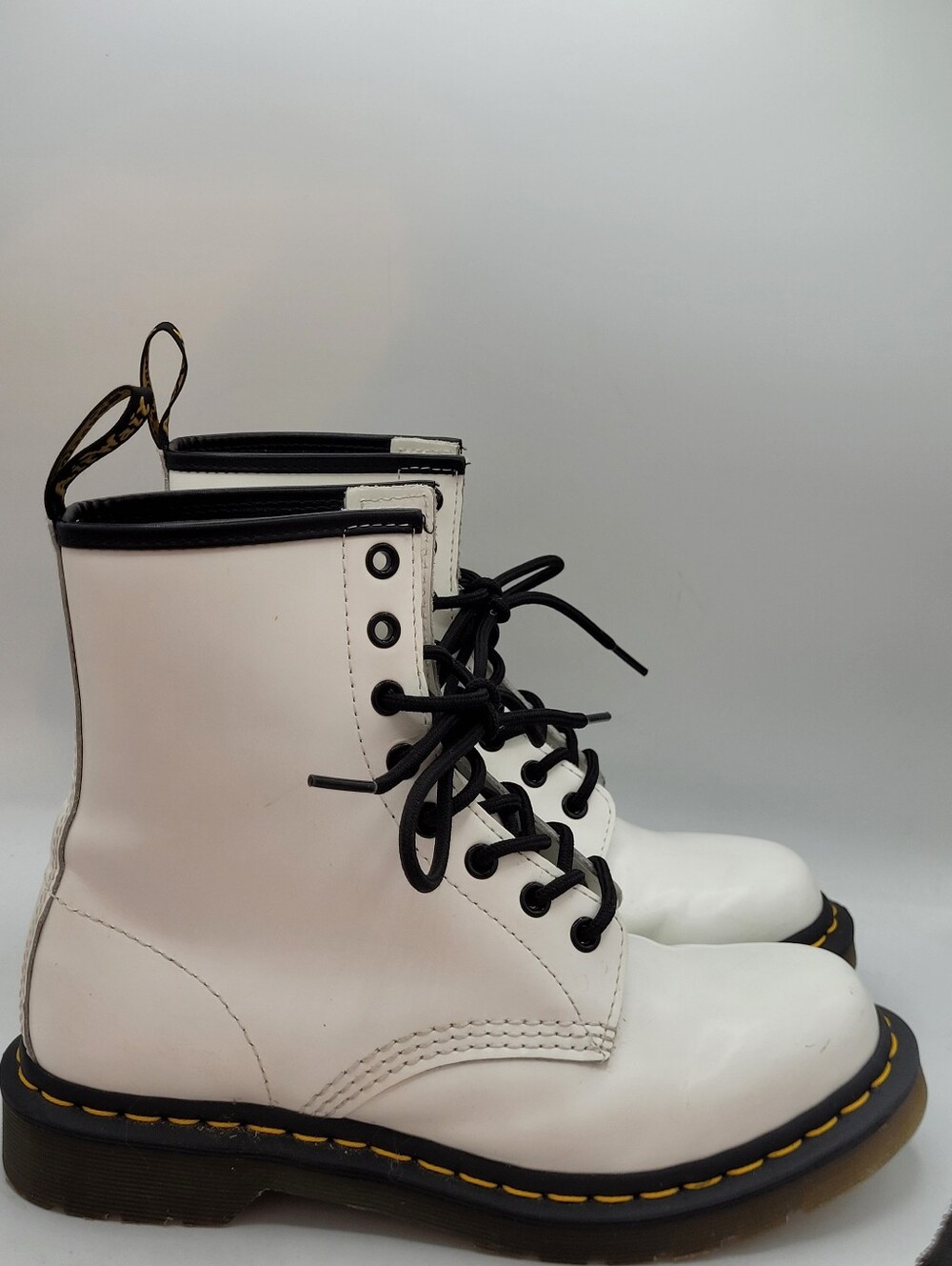 Dr. Martens White Leather Combat Boots with Black Trim